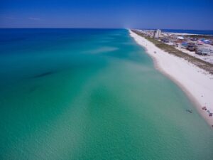 850 and 448 are Florida's two area codes. Brennon Williamson Flying over the crystal clear waters of the Emerald Coast