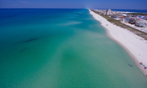 850 and 448 are Florida's two area codes. Brennon Williamson Flying over the crystal clear waters of the Emerald Coast